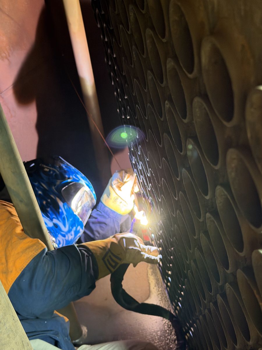 Seal welding a tube plug at the tube nest plate